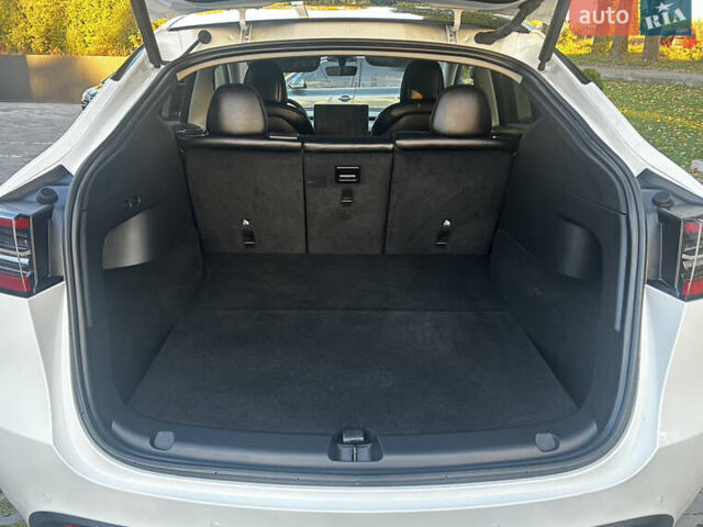 Тесла Model Y 2022 в Тернополе на Automoto.ua Белый Тесла Model Y, объемом двигателя 0 л и пробегом 52 тыс. км за 27300 $, фото 17 на Automoto.ua