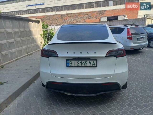 Белый Тесла Model Y, объемом двигателя 0 л и пробегом 61 тыс. км за 26000 $, фото 2 на Automoto.ua
