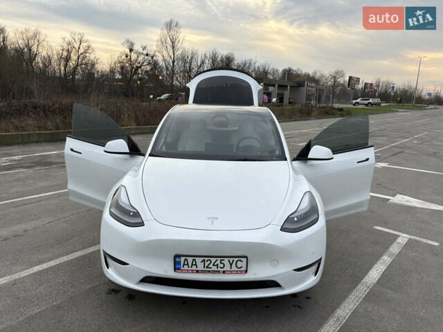 Білий Тесла Model Y, об'ємом двигуна 0 л та пробігом 65 тис. км за 29500 $, фото 8 на Automoto.ua
