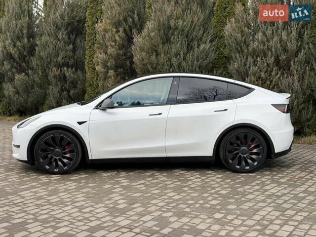 Белый Тесла Model Y, объемом двигателя 0 л и пробегом 129 тыс. км за 27400 $, фото 32 на Automoto.ua