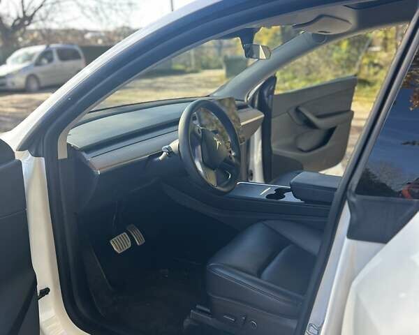 Білий Тесла Model Y, об'ємом двигуна 0 л та пробігом 62 тис. км за 29700 $, фото 14 на Automoto.ua