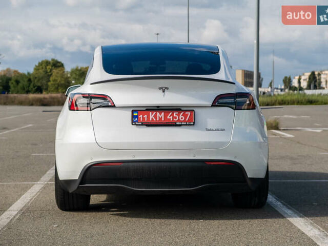 Белый Тесла Model Y, объемом двигателя 0 л и пробегом 51 тыс. км за 29500 $, фото 6 на Automoto.ua