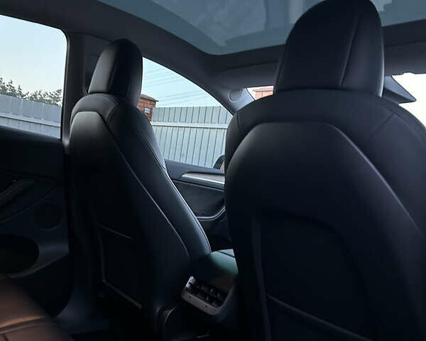 Белый Тесла Model Y, объемом двигателя 0 л и пробегом 58 тыс. км за 40000 $, фото 28 на Automoto.ua