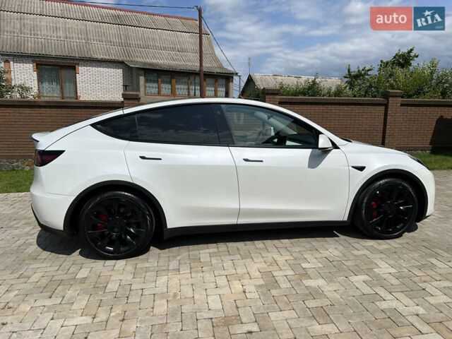 Білий Тесла Model Y, об'ємом двигуна 0 л та пробігом 43 тис. км за 28500 $, фото 7 на Automoto.ua