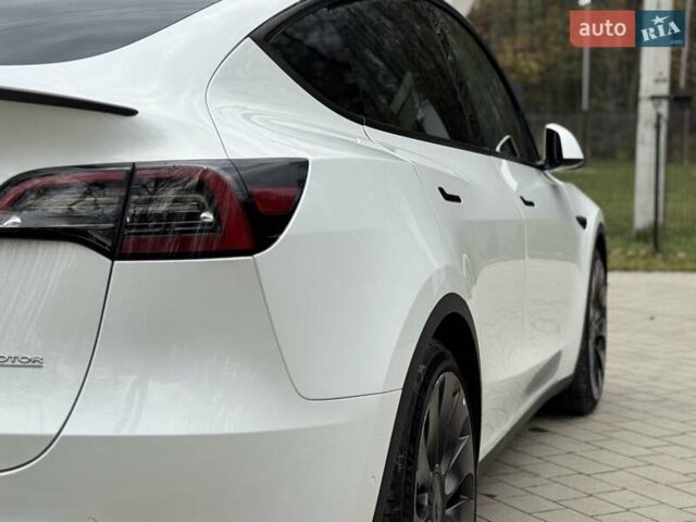Білий Тесла Model Y, об'ємом двигуна 0 л та пробігом 117 тис. км за 23500 $, фото 17 на Automoto.ua