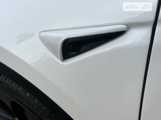 Белый Тесла Model Y, объемом двигателя 0 л и пробегом 21 тыс. км за 34999 $, фото 9 на Automoto.ua