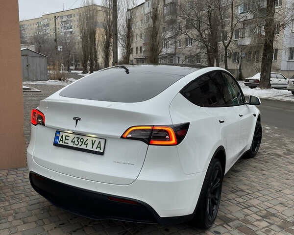Белый Тесла Model Y, объемом двигателя 0 л и пробегом 56 тыс. км за 35000 $, фото 5 на Automoto.ua