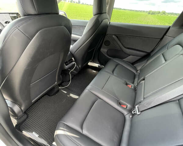 Белый Тесла Model Y, объемом двигателя 0 л и пробегом 76 тыс. км за 24900 $, фото 24 на Automoto.ua