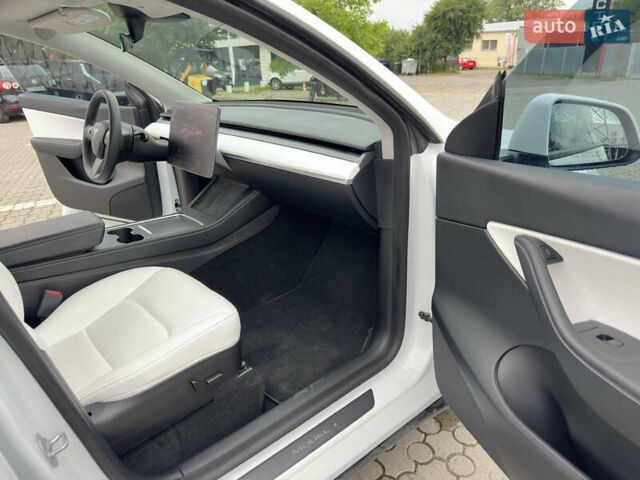 Білий Тесла Model Y, об'ємом двигуна 0 л та пробігом 49 тис. км за 32500 $, фото 25 на Automoto.ua