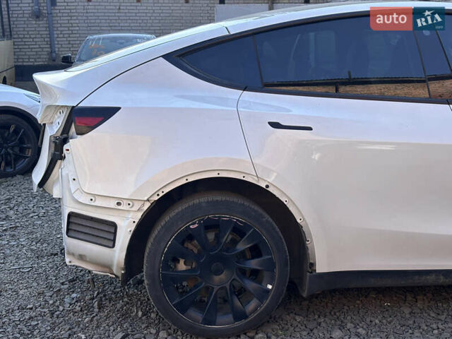 Белый Тесла Model Y, объемом двигателя 0 л и пробегом 141 тыс. км за 18300 $, фото 9 на Automoto.ua