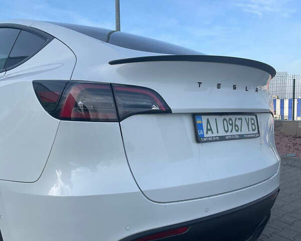 Білий Тесла Model Y, об'ємом двигуна 0 л та пробігом 60 тис. км за 24900 $, фото 40 на Automoto.ua