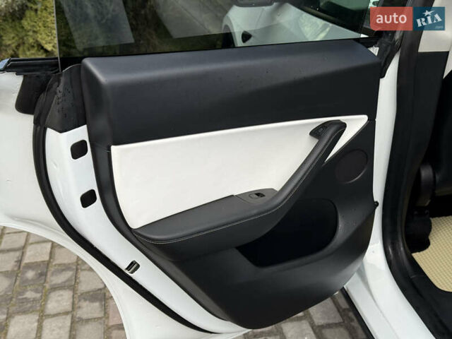 Белый Тесла Model Y, объемом двигателя 0 л и пробегом 129 тыс. км за 27400 $, фото 24 на Automoto.ua