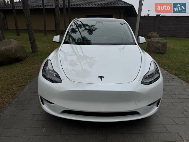 Белый Тесла Model Y, объемом двигателя 0 л и пробегом 74 тыс. км за 25700 $, фото 1 на Automoto.ua