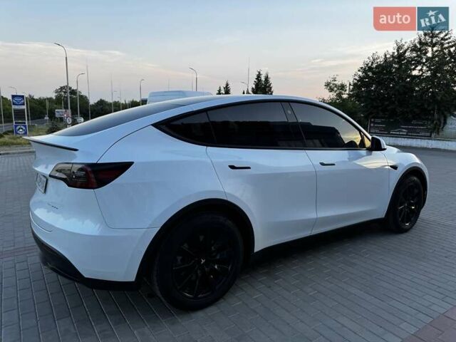 Белый Тесла Model Y, объемом двигателя 0 л и пробегом 59 тыс. км за 28800 $, фото 75 на Automoto.ua