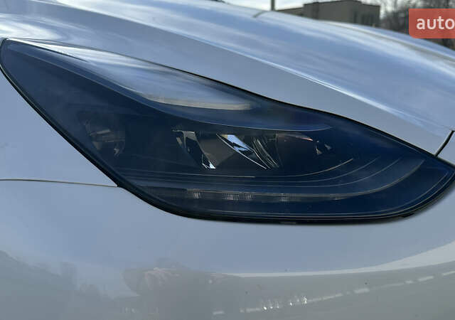 Білий Тесла Model Y, об'ємом двигуна 0 л та пробігом 63 тис. км за 28700 $, фото 21 на Automoto.ua