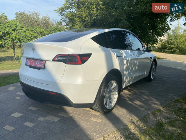 Белый Тесла Model Y, объемом двигателя 0 л и пробегом 58 тыс. км за 24000 $, фото 68 на Automoto.ua