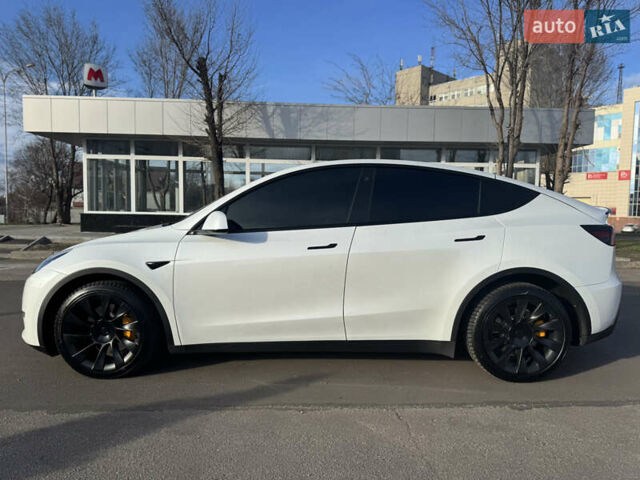 Білий Тесла Model Y, об'ємом двигуна 0 л та пробігом 53 тис. км за 28000 $, фото 2 на Automoto.ua