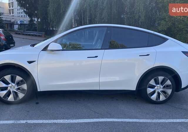 Білий Тесла Model Y, об'ємом двигуна 0 л та пробігом 100 тис. км за 25400 $, фото 4 на Automoto.ua