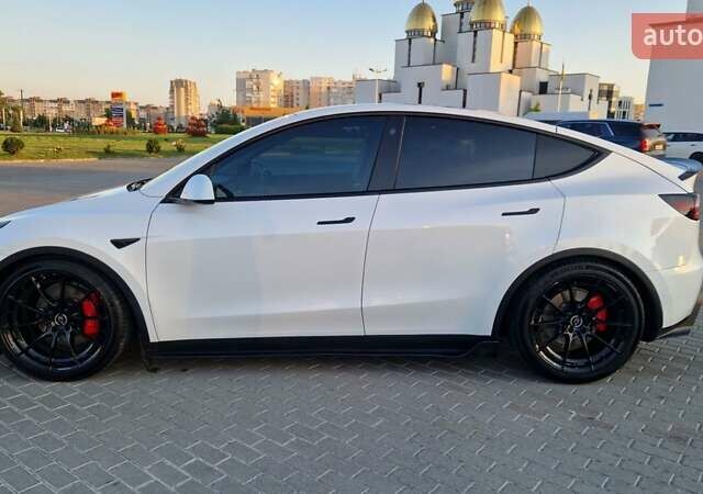 Белый Тесла Model Y, объемом двигателя 0 л и пробегом 85 тыс. км за 33000 $, фото 5 на Automoto.ua