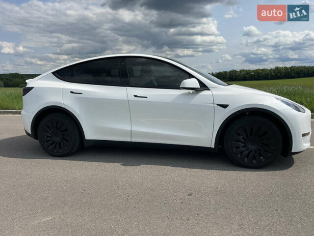 Белый Тесла Model Y, объемом двигателя 0 л и пробегом 76 тыс. км за 24900 $, фото 6 на Automoto.ua