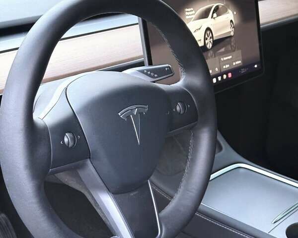 Белый Тесла Model Y, объемом двигателя 0 л и пробегом 51 тыс. км за 38300 $, фото 8 на Automoto.ua
