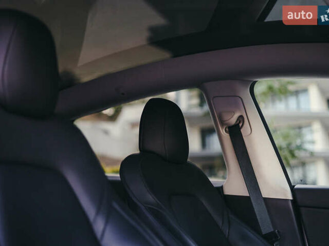Белый Тесла Model Y, объемом двигателя 0 л и пробегом 45 тыс. км за 28900 $, фото 25 на Automoto.ua