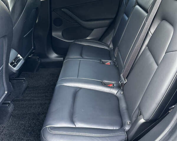 Белый Тесла Model Y, объемом двигателя 0 л и пробегом 61 тыс. км за 24700 $, фото 11 на Automoto.ua