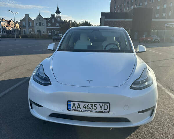 Белый Тесла Model Y, объемом двигателя 0 л и пробегом 61 тыс. км за 27000 $, фото 1 на Automoto.ua