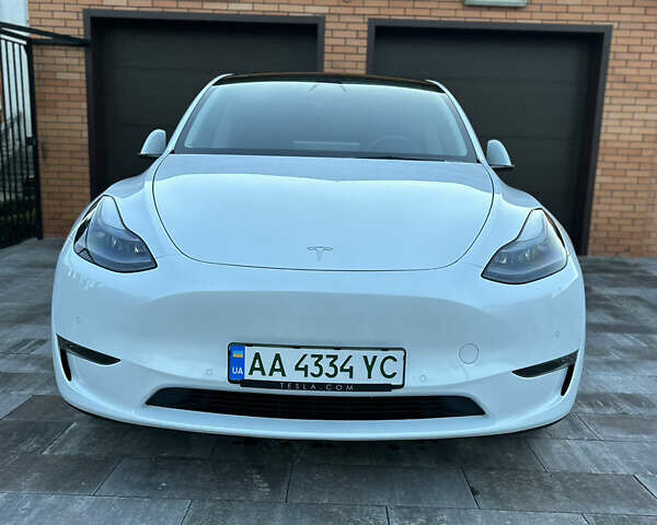 Белый Тесла Model Y, объемом двигателя 0 л и пробегом 58 тыс. км за 40000 $, фото 11 на Automoto.ua