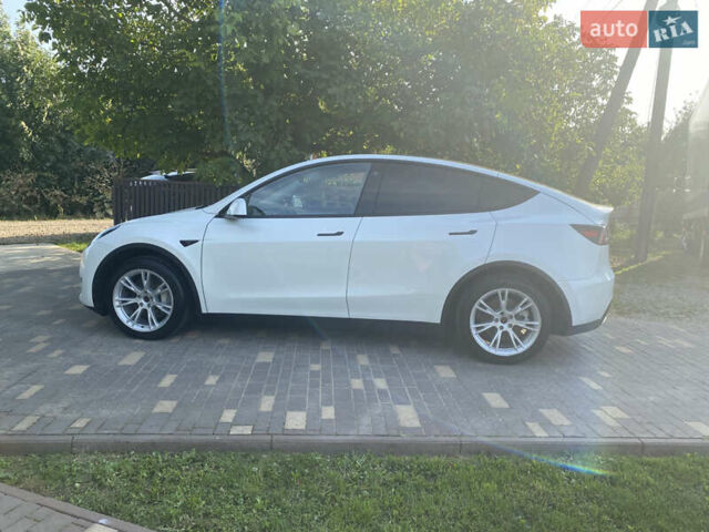 Белый Тесла Model Y, объемом двигателя 0 л и пробегом 58 тыс. км за 24000 $, фото 49 на Automoto.ua