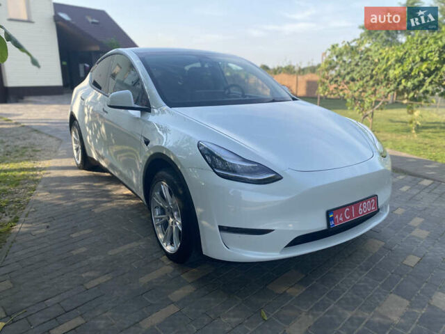 Белый Тесла Model Y, объемом двигателя 0 л и пробегом 58 тыс. км за 24000 $, фото 65 на Automoto.ua