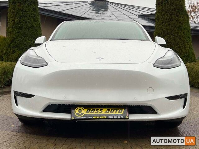 Белый Тесла Model Y, объемом двигателя 82 л и пробегом 22 тыс. км за 41600 $, фото 1 на Automoto.ua