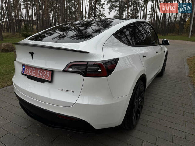 Белый Тесла Model Y, объемом двигателя 0 л и пробегом 74 тыс. км за 25700 $, фото 7 на Automoto.ua