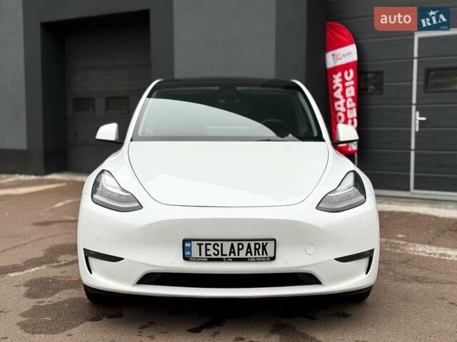 Білий Тесла Model Y, об'ємом двигуна 0 л та пробігом 60 тис. км за 28500 $, фото 2 на Automoto.ua