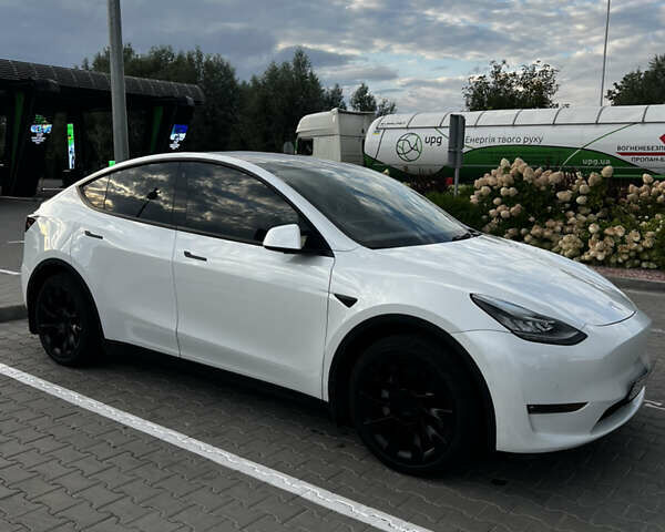 Белый Тесла Model Y, объемом двигателя 0 л и пробегом 93 тыс. км за 26200 $, фото 1 на Automoto.ua