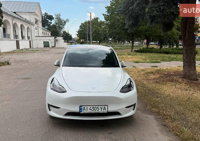 Білий Тесла Model Y, об'ємом двигуна 0 л та пробігом 80 тис. км за 33000 $, фото 3 на Automoto.ua