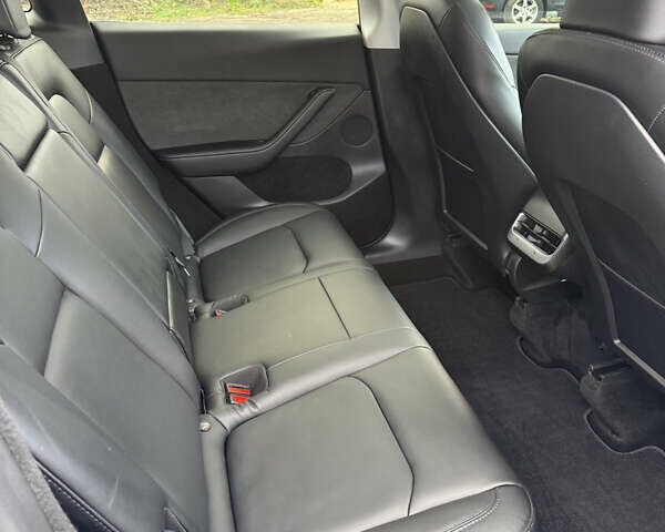 Белый Тесла Model Y, объемом двигателя 0 л и пробегом 16 тыс. км за 26500 $, фото 38 на Automoto.ua