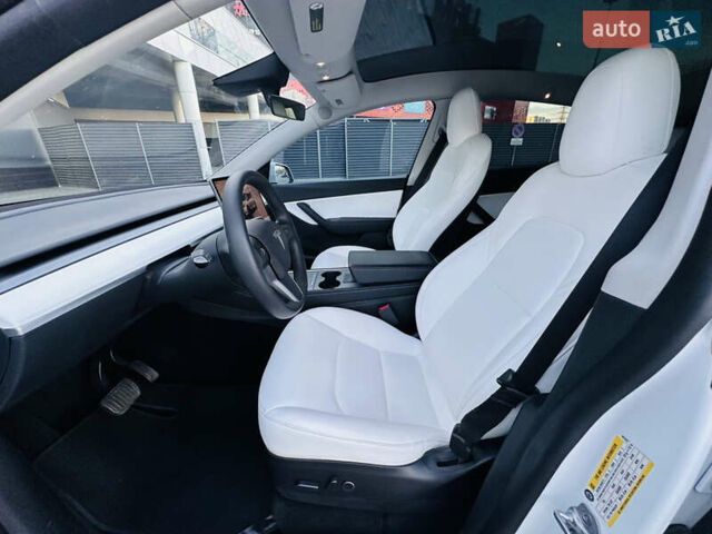 Белый Тесла Model Y, объемом двигателя 0 л и пробегом 47 тыс. км за 25900 $, фото 13 на Automoto.ua