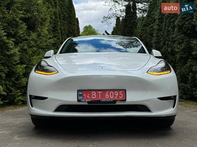 Белый Тесла Model Y, объемом двигателя 0 л и пробегом 18 тыс. км за 25499 $, фото 77 на Automoto.ua