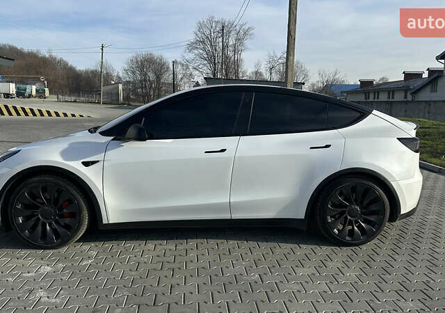 Білий Тесла Model Y, об'ємом двигуна 0 л та пробігом 63 тис. км за 28700 $, фото 24 на Automoto.ua