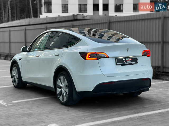 Белый Тесла Model Y, объемом двигателя 0 л и пробегом 1 тыс. км за 39000 $, фото 2 на Automoto.ua