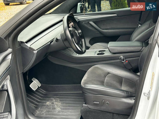 Белый Тесла Model Y, объемом двигателя 0 л и пробегом 57 тыс. км за 32000 $, фото 8 на Automoto.ua