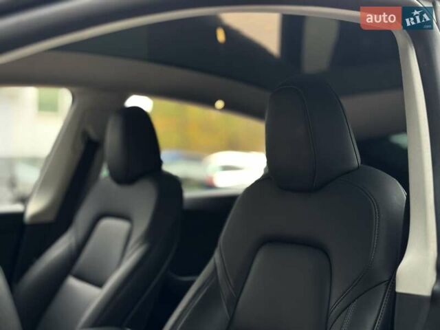 Білий Тесла Model Y, об'ємом двигуна 0 л та пробігом 60 тис. км за 28500 $, фото 13 на Automoto.ua