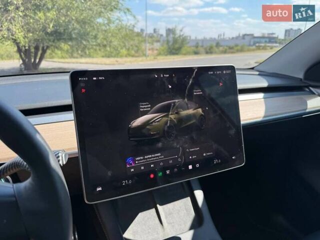 Білий Тесла Model Y, об'ємом двигуна 0 л та пробігом 56 тис. км за 26000 $, фото 43 на Automoto.ua