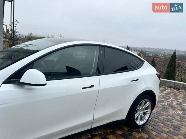 Белый Тесла Model Y, объемом двигателя 0 л и пробегом 94 тыс. км за 29999 $, фото 6 на Automoto.ua