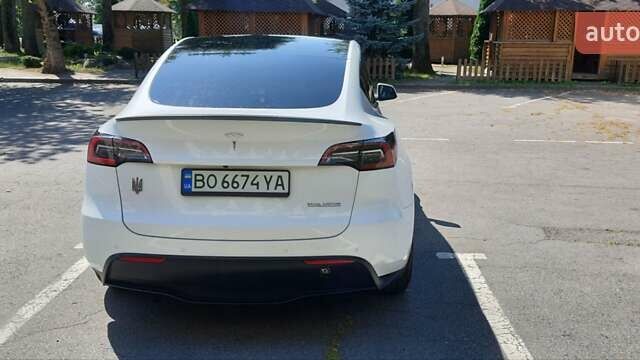 Белый Тесла Model Y, объемом двигателя 0 л и пробегом 62 тыс. км за 30700 $, фото 4 на Automoto.ua