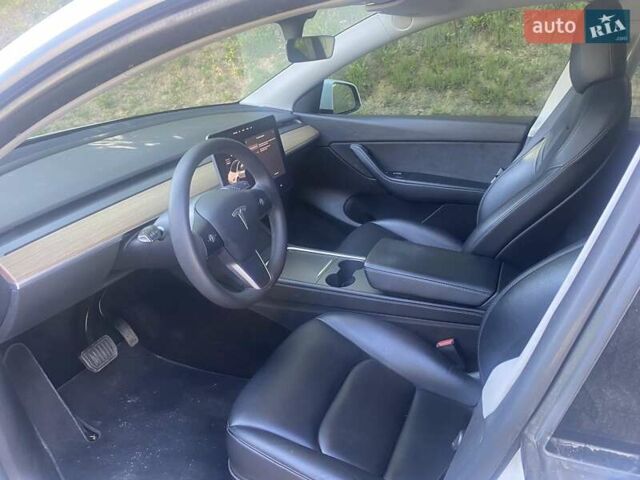 Белый Тесла Model Y, объемом двигателя 0 л и пробегом 100 тыс. км за 23000 $, фото 5 на Automoto.ua