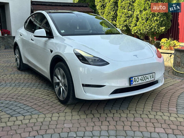 Белый Тесла Model Y, объемом двигателя 0 л и пробегом 129 тыс. км за 36499 $, фото 6 на Automoto.ua