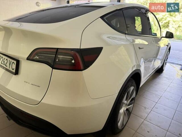 Белый Тесла Model Y, объемом двигателя 0 л и пробегом 76 тыс. км за 32800 $, фото 2 на Automoto.ua