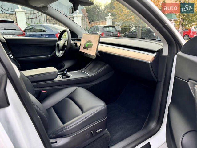 Білий Тесла Model Y, об'ємом двигуна 0 л та пробігом 58 тис. км за 28900 $, фото 18 на Automoto.ua